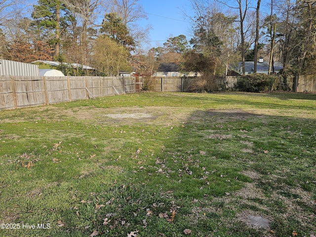 view of yard featuring a fenced backyard