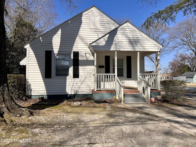 bungalow-style house featuring covered porch