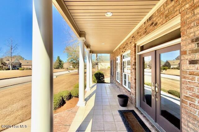 906 Taberna Cir, New Bern, NC 28562 - view of patio / terrace with french doors and covered porch