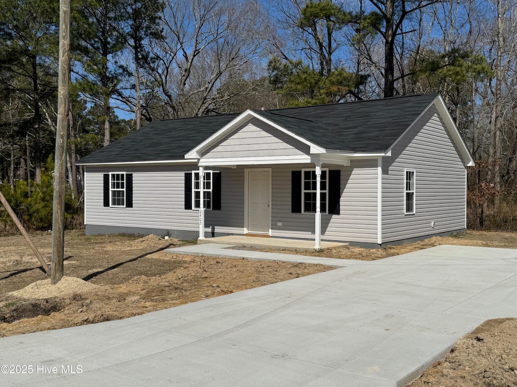 ranch-style home with covered porch