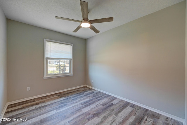 137 El Ogden Dr, Wilmington, NC 28411 - spare room with ceiling fan, a textured ceiling, baseboards, and wood finished floors