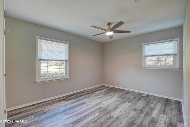 137 El Ogden Dr, Wilmington, NC 28411 - empty room with a ceiling fan, baseboards, and wood finished floors