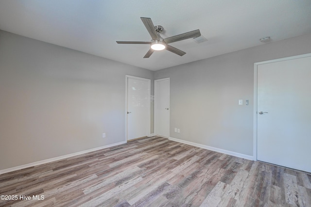 137 El Ogden Dr, Wilmington, NC 28411 - unfurnished room with ceiling fan, baseboards, and wood finished floors
