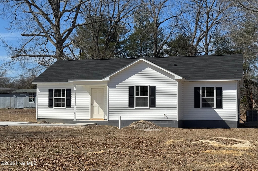 view of front of home featuring central AC unit