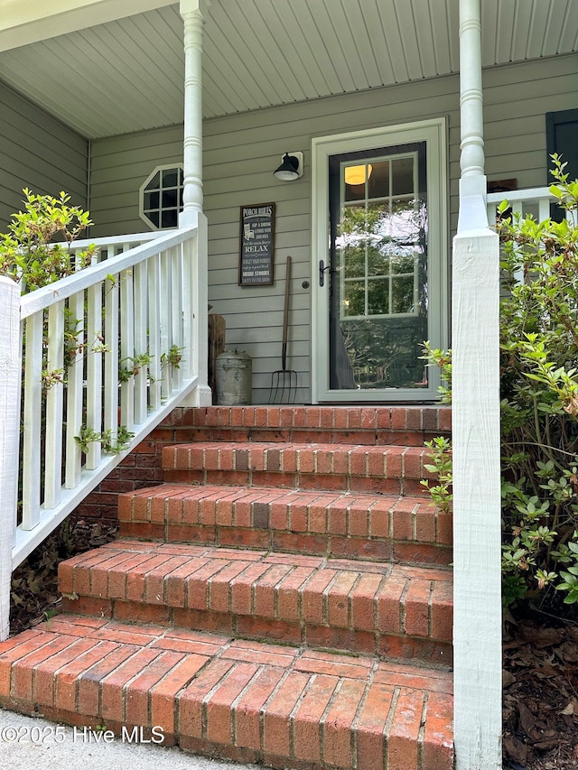 entrance to property with covered porch