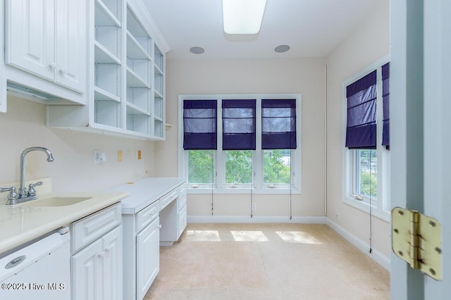 917 Hearthside Ct, New Bern, NC 28560 - kitchen with a sink, light carpet, healthy amount of natural light, and light countertops