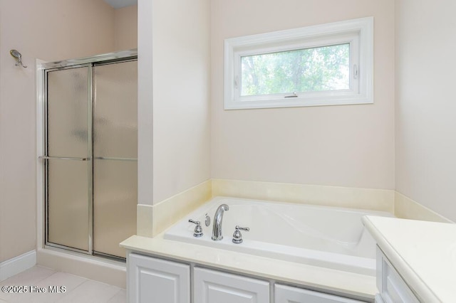 917 Hearthside Ct, New Bern, NC 28560 - full bath featuring a stall shower, a garden tub, and vanity