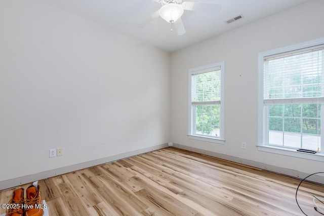 917 Hearthside Ct, New Bern, NC 28560 - unfurnished room with light wood-style floors, baseboards, and a ceiling fan
