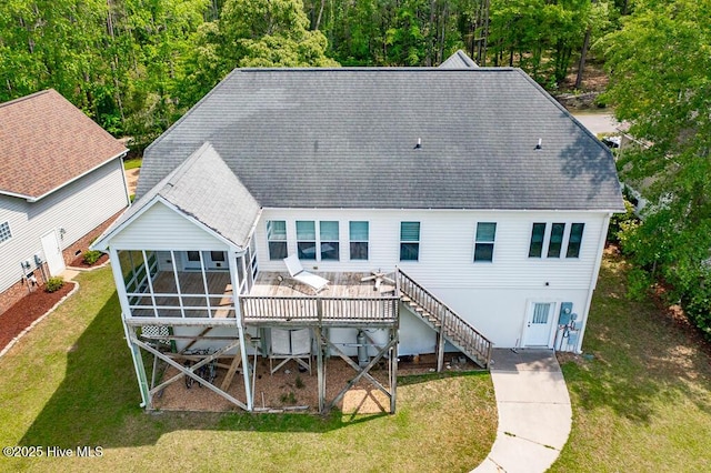 917 Hearthside Ct, New Bern, NC 28560 - back of house with a shingled roof, a yard, and a deck