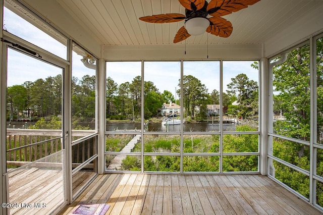 917 Hearthside Ct, New Bern, NC 28560 - unfurnished sunroom with a water view, ceiling fan, and view of scattered trees