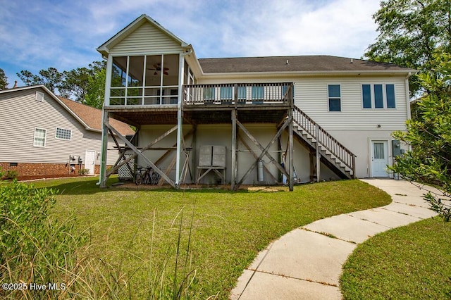 917 Hearthside Ct, New Bern, NC 28560 - rear view of property featuring stairway, a sunroom, a lawn, a wooden deck, and a ceiling fan