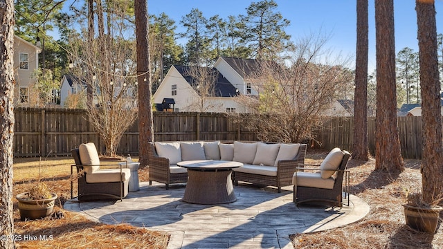 view of patio featuring a fenced backyard and an outdoor hangout area