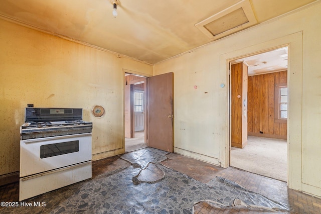 kitchen with white range with gas cooktop