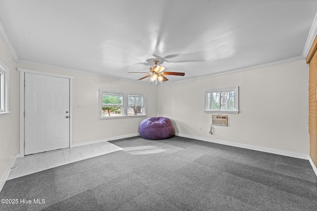 interior space featuring ornamental molding, carpet, baseboards, and a wall mounted AC