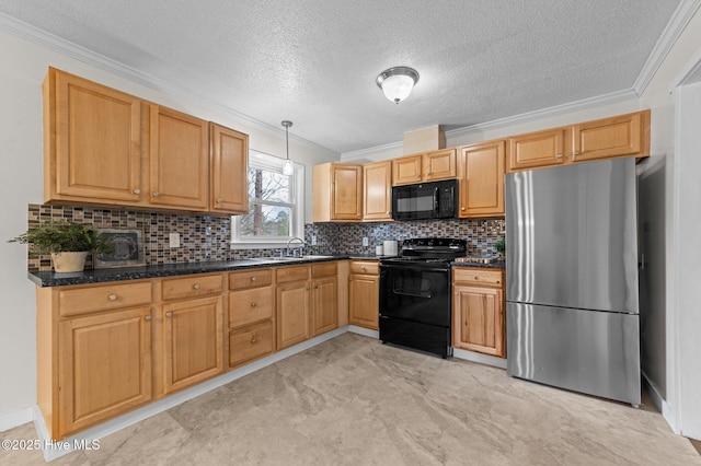 kitchen featuring pendant lighting, backsplash, ornamental molding, a sink, and black appliances