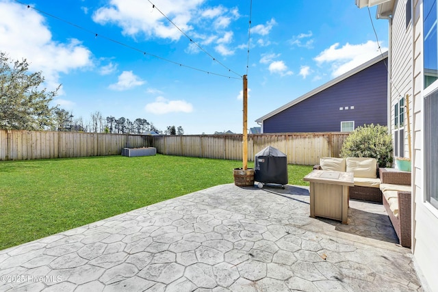 view of patio / terrace with an outdoor hangout area and a fenced backyard