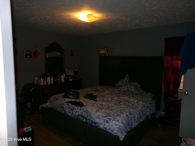 bedroom featuring a textured ceiling