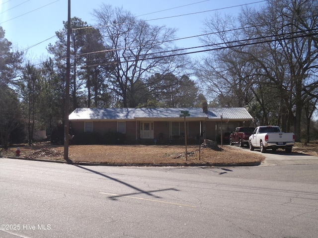 view of front of home with concrete driveway