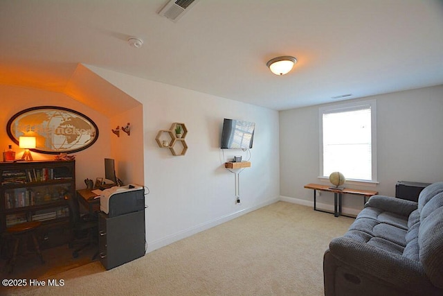 living area with visible vents, carpet flooring, and baseboards