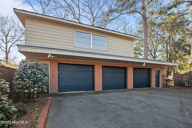 garage featuring fence