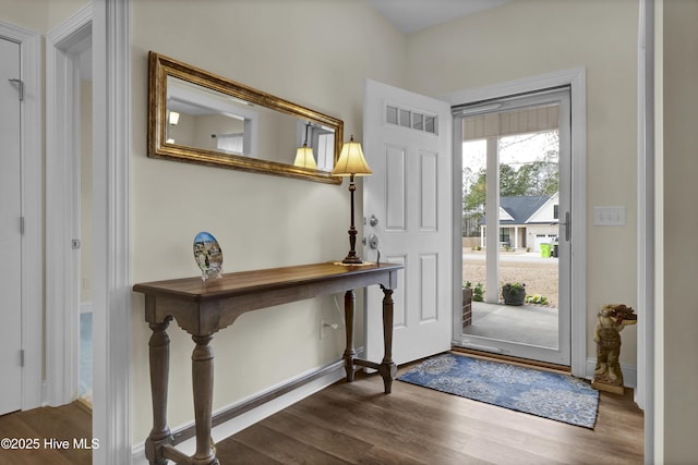 foyer entrance with wood finished floors