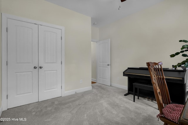 office area featuring carpet and baseboards