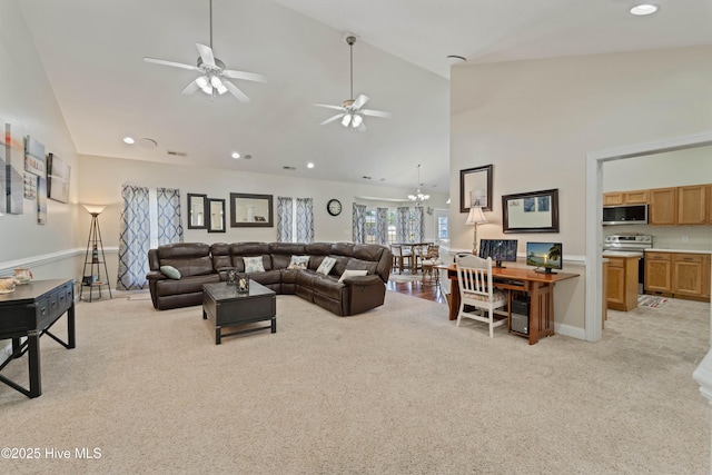 living area with recessed lighting, light colored carpet, high vaulted ceiling, and visible vents