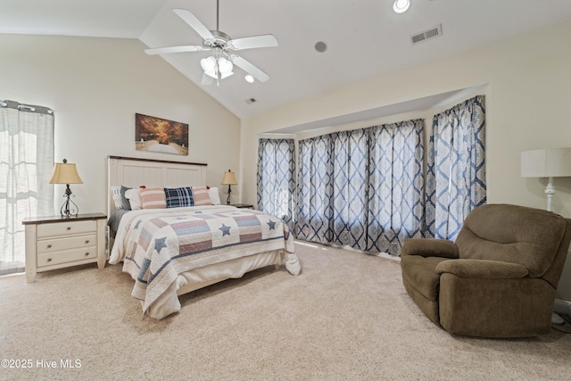 bedroom featuring high vaulted ceiling, carpet flooring, visible vents, and ceiling fan