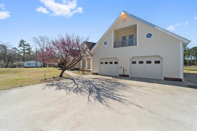 view of home's exterior featuring driveway