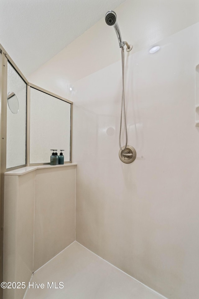 bathroom featuring walk in shower