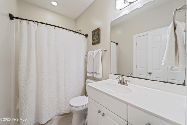 full bath featuring tile patterned floors, toilet, and vanity