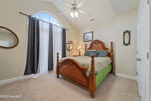 carpeted bedroom featuring visible vents, a closet, baseboards, ceiling fan, and vaulted ceiling