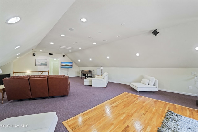 living area featuring vaulted ceiling, carpet flooring, recessed lighting, and baseboards