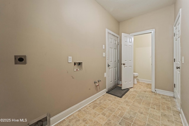 laundry area featuring electric dryer hookup, baseboards, gas dryer hookup, and hookup for a washing machine