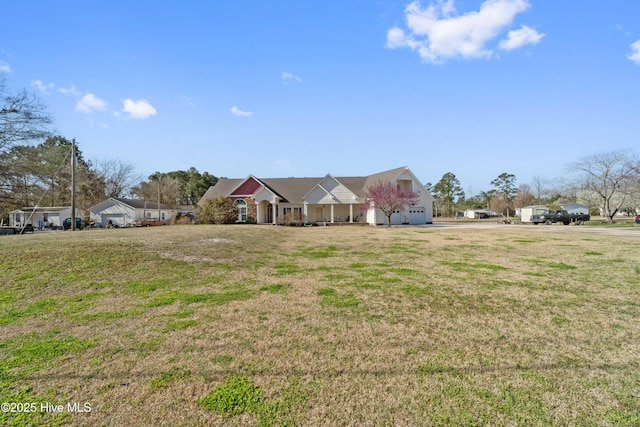 view of front of house with a front lawn