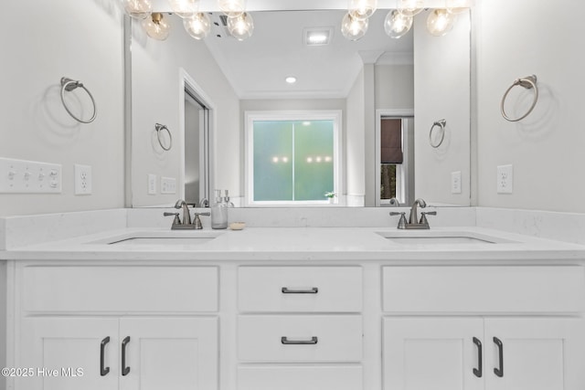 full bathroom featuring double vanity and a sink