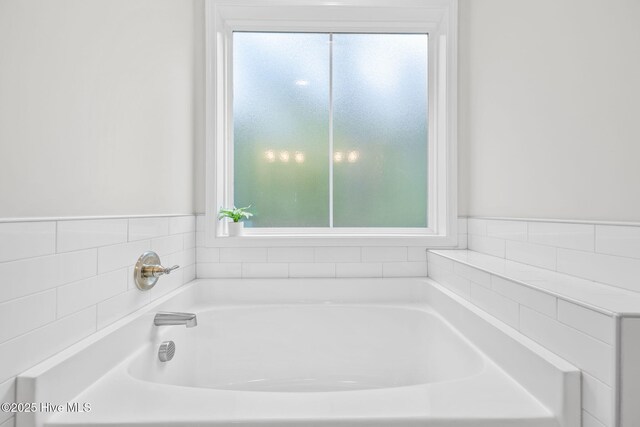 876 Elderberry Dr, Vass, NC 28394 - bathroom with a garden tub