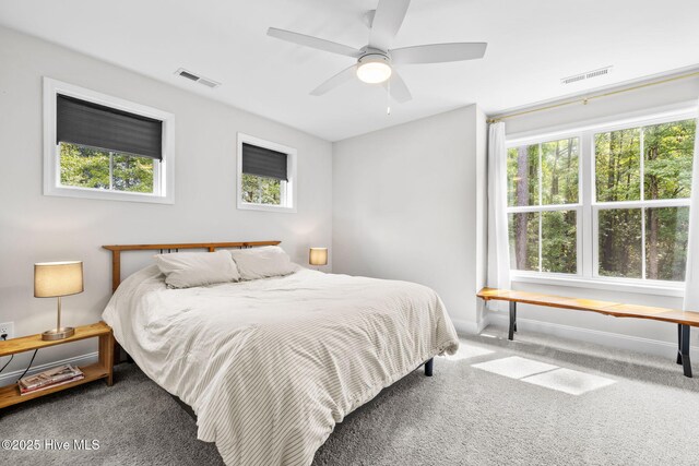 876 Elderberry Dr, Vass, NC 28394 - bedroom featuring a ceiling fan, carpet floors, baseboards, and visible vents