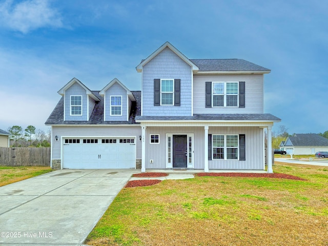 view of front of home featuring a front yard, fence, a porch, concrete driveway, and a garage