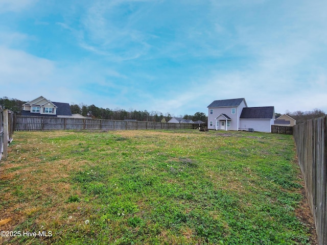 view of yard featuring a fenced backyard