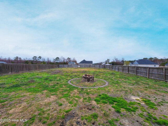 view of yard with a fenced backyard