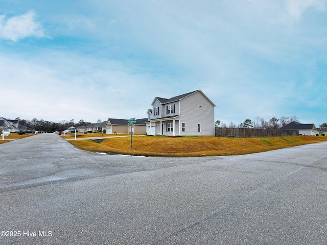 view of road featuring a residential view