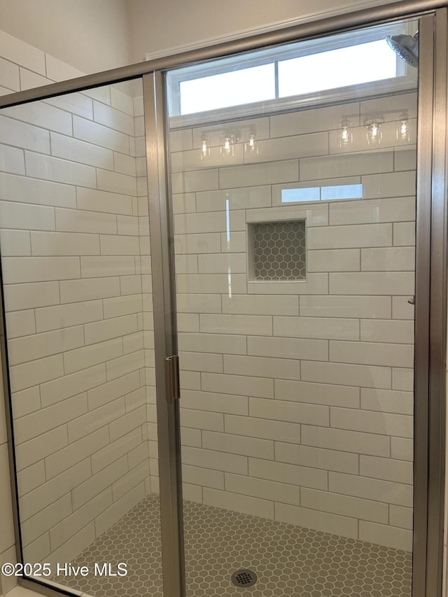 bathroom with a stall shower