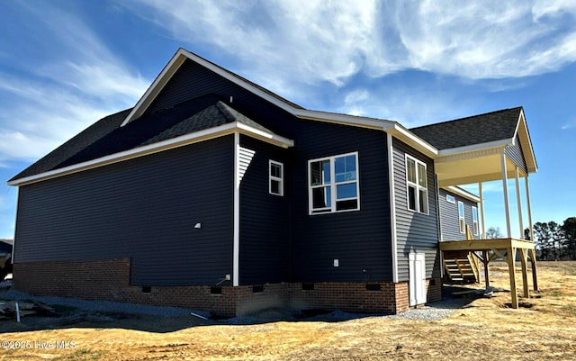 view of side of property featuring crawl space