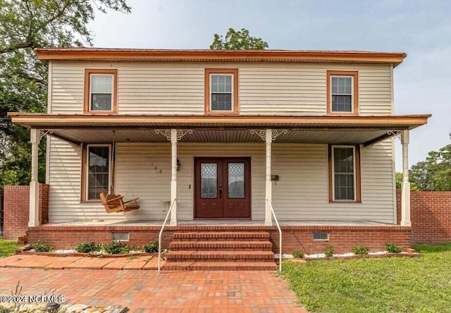 view of front of home featuring crawl space and covered porch