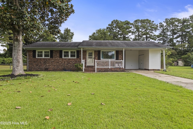 ranch-style home with brick siding, concrete driveway, crawl space, an attached carport, and a front lawn