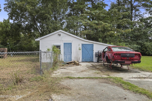 garage with fence