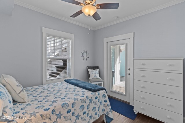 bedroom featuring dark wood-style floors, crown molding, ceiling fan, and access to outside