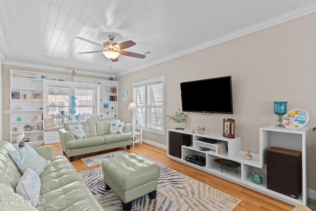 living room featuring wood finished floors, baseboards, ornamental molding, ceiling fan, and wood ceiling