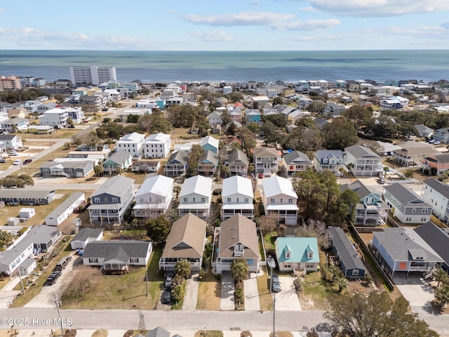 birds eye view of property featuring a residential view and a water view